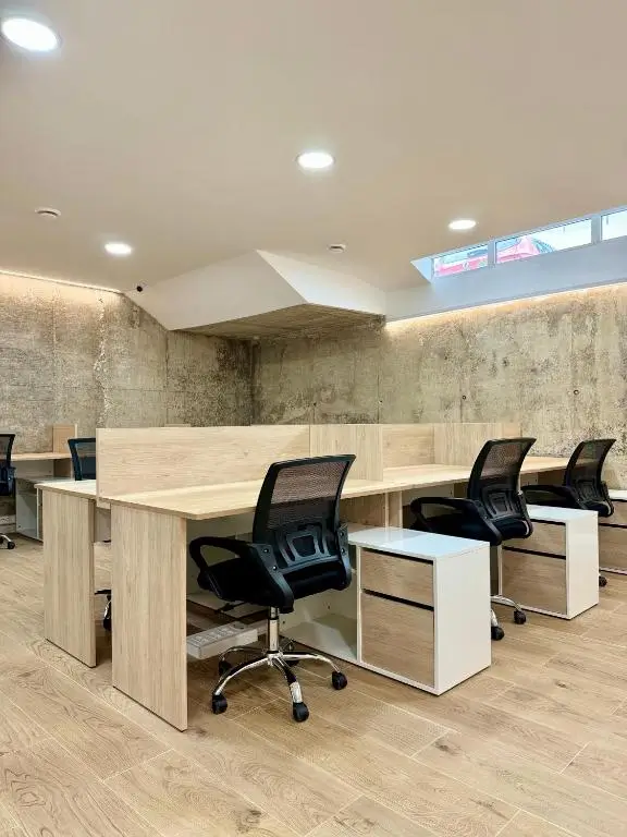 Work area — Desks and office chairs for studying or working calmly outside the suite.